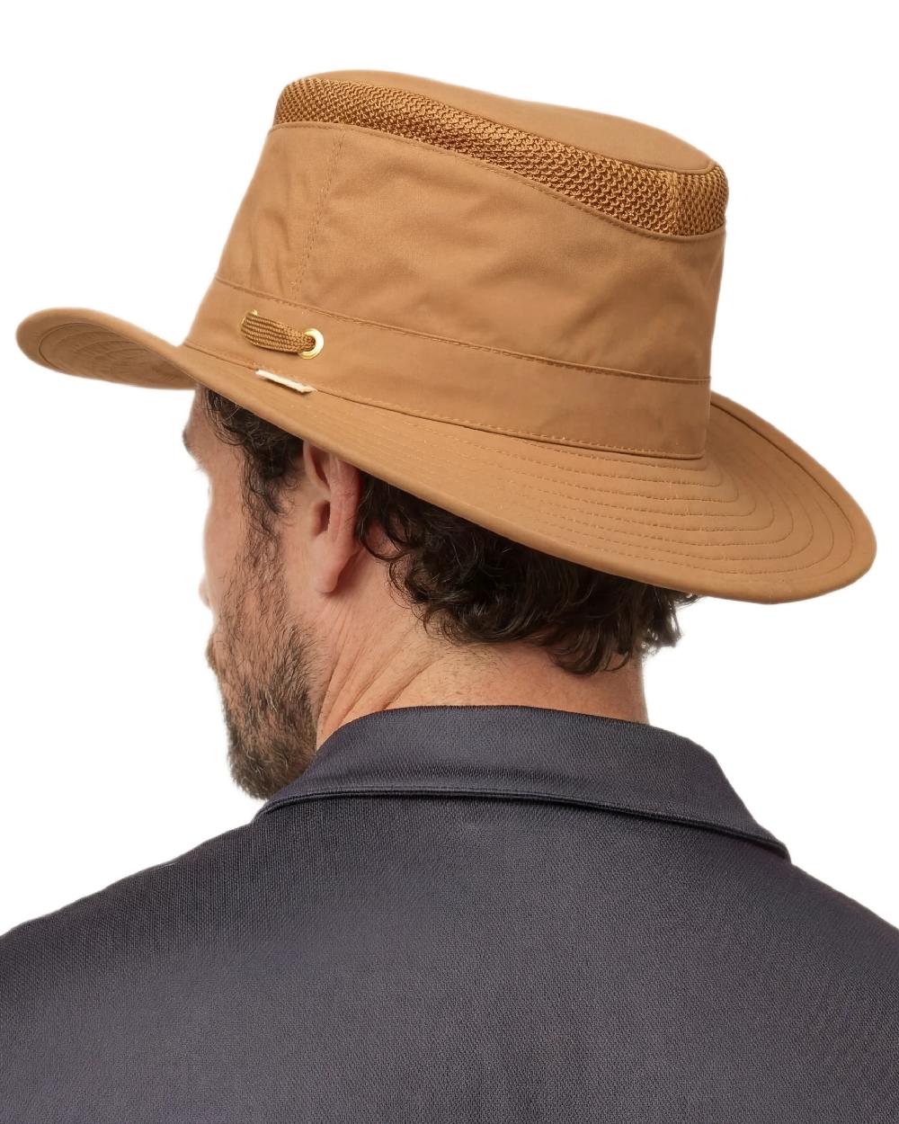 Toffee Coloured Tilley Airflo Medium Brim Recycled Hat on white background