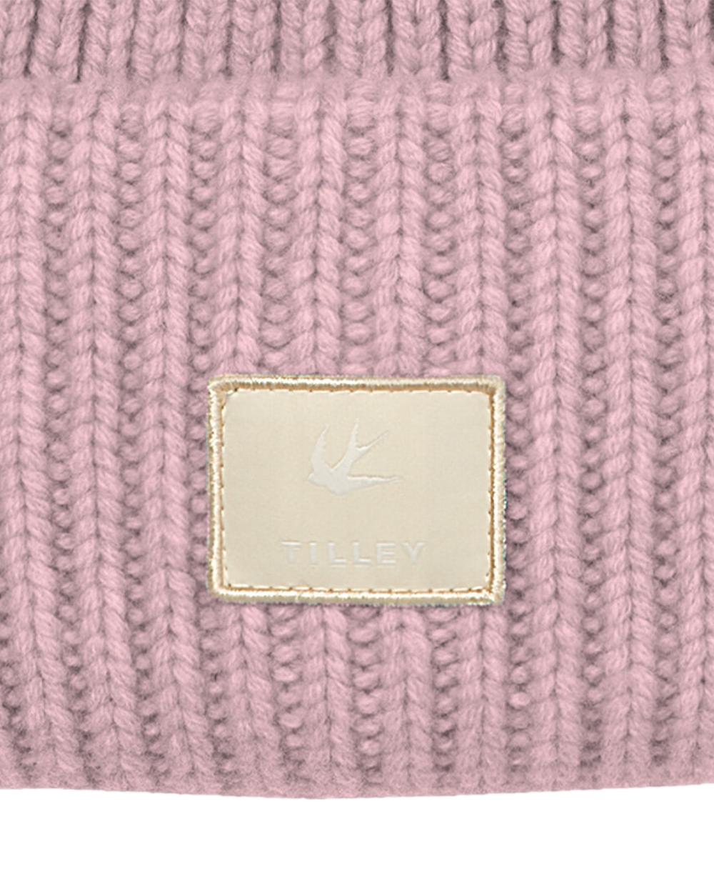 Pink Coloured Tilley Alpine Beanie on white background