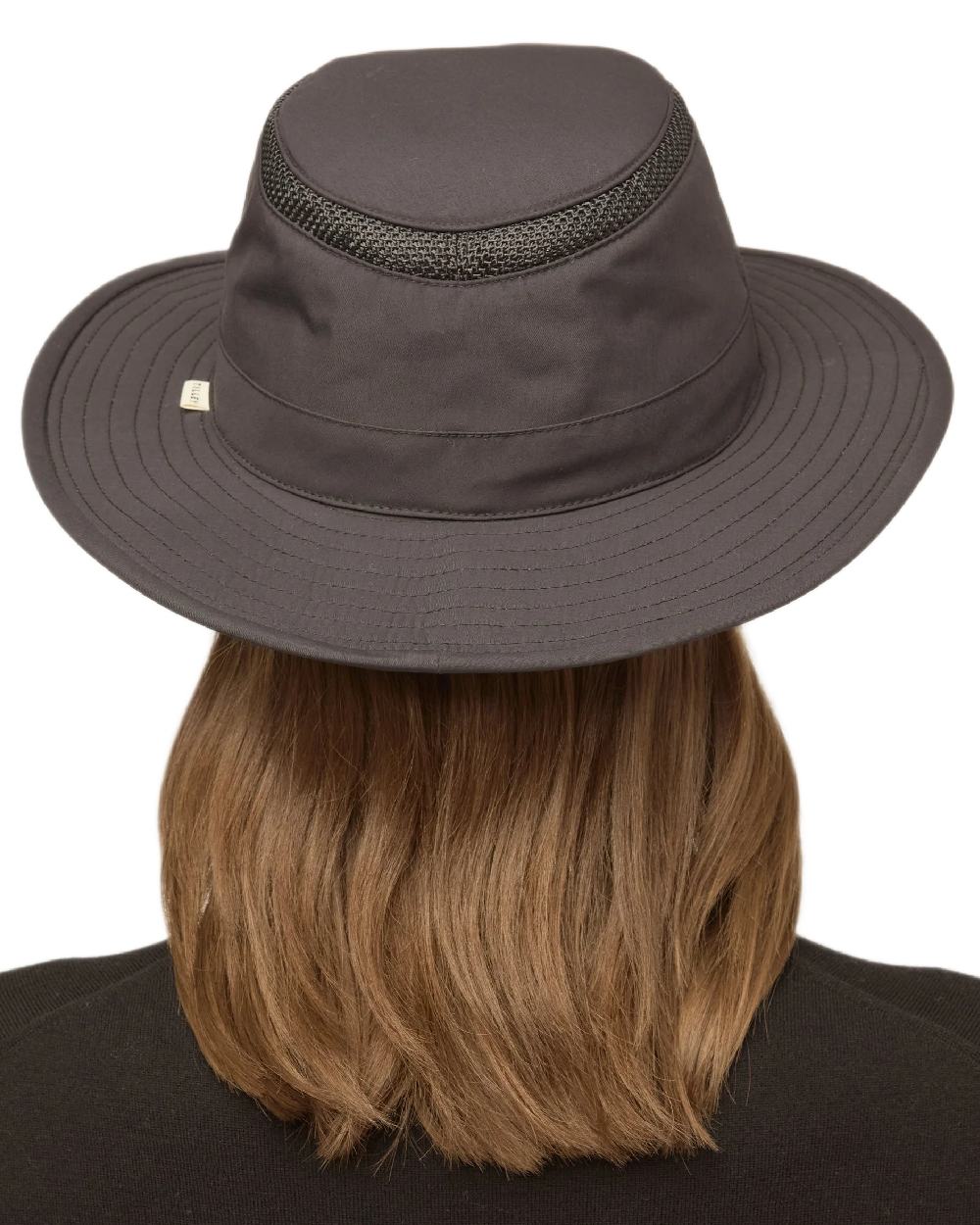 Black Coloured Tilley LTM5 Winterised Airflo Slim Sun Hat on white background