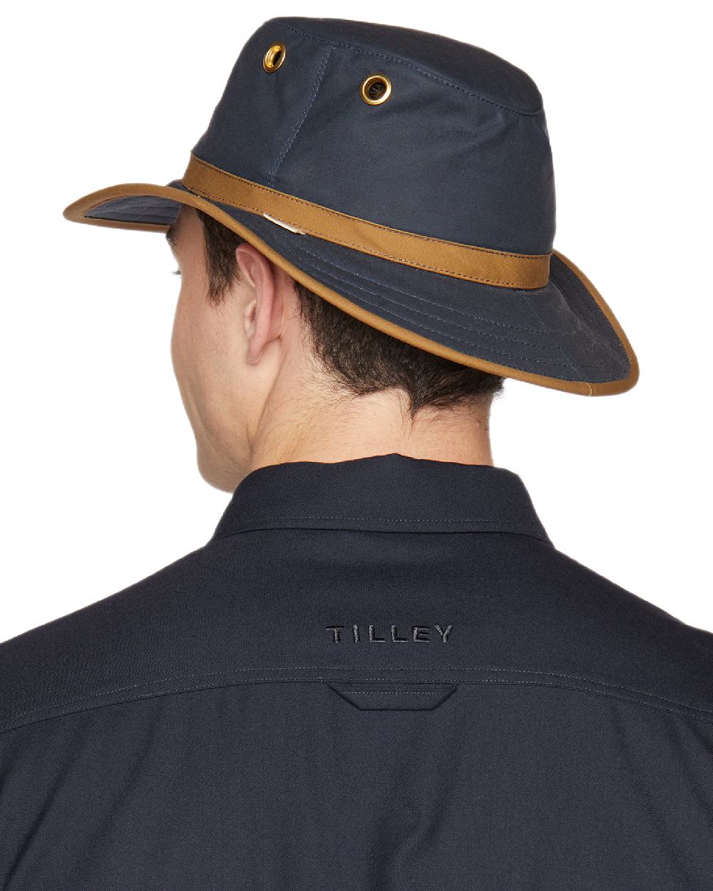 Navy British Tan Coloured Tilley Outback Waxed Cotton Hat on white background