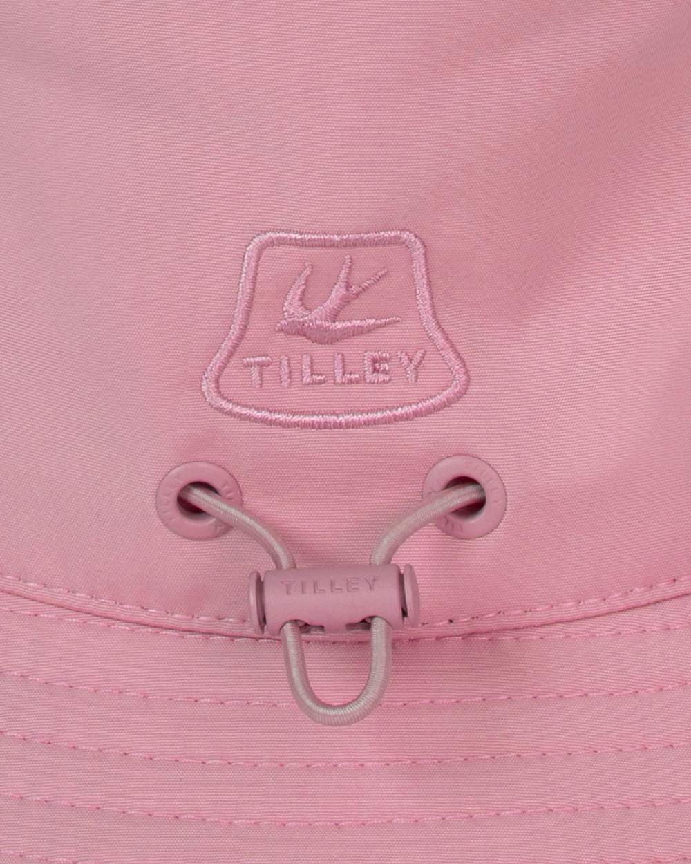 Pink Coloured Tilley T1 Performance Bucket Hat on white background