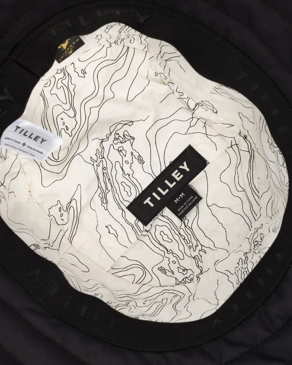 Black Coloured Tilley Thermashield T1 on white background