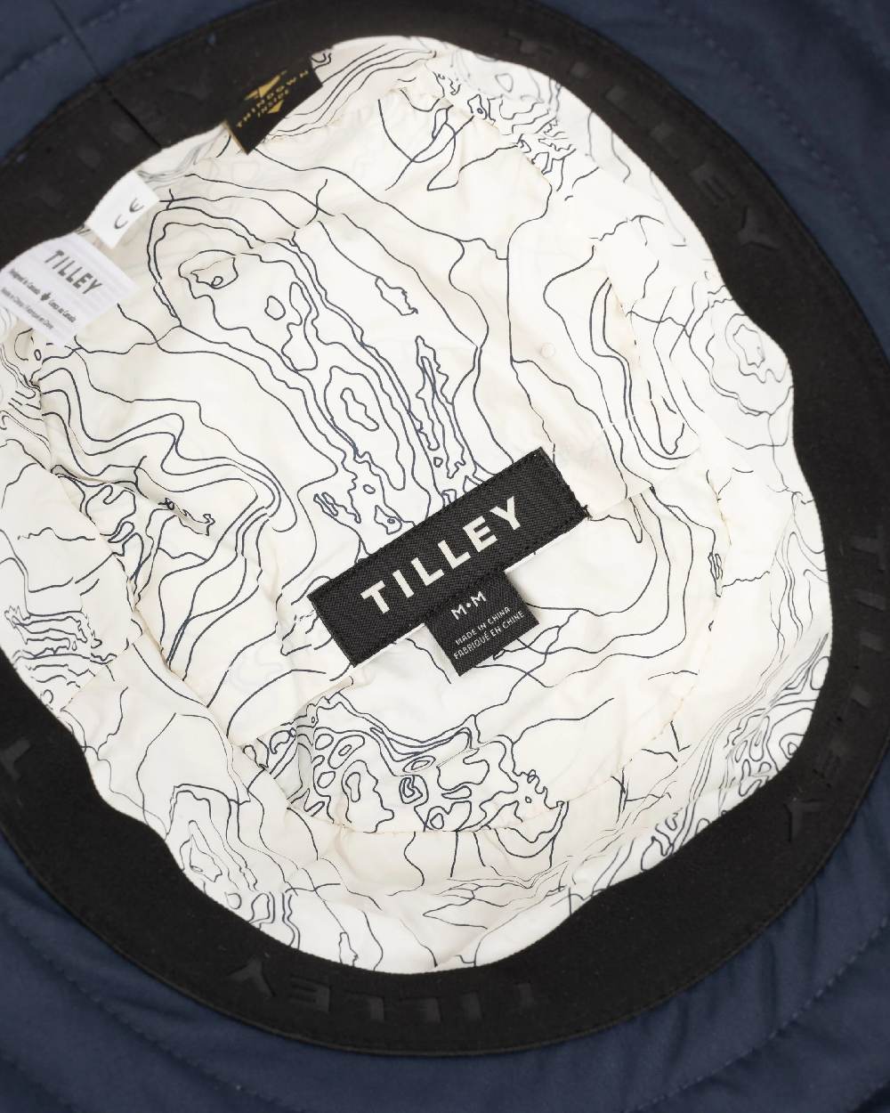 Dark Navy Coloured Tilley Thermashield T1 on white background