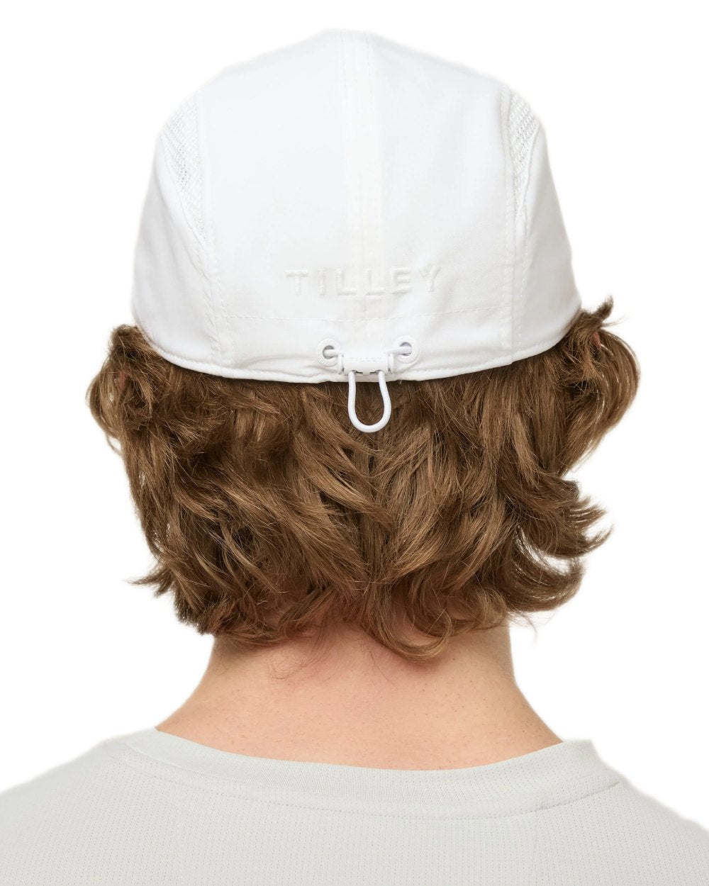 White coloured Tilley Airflo Cap on white background