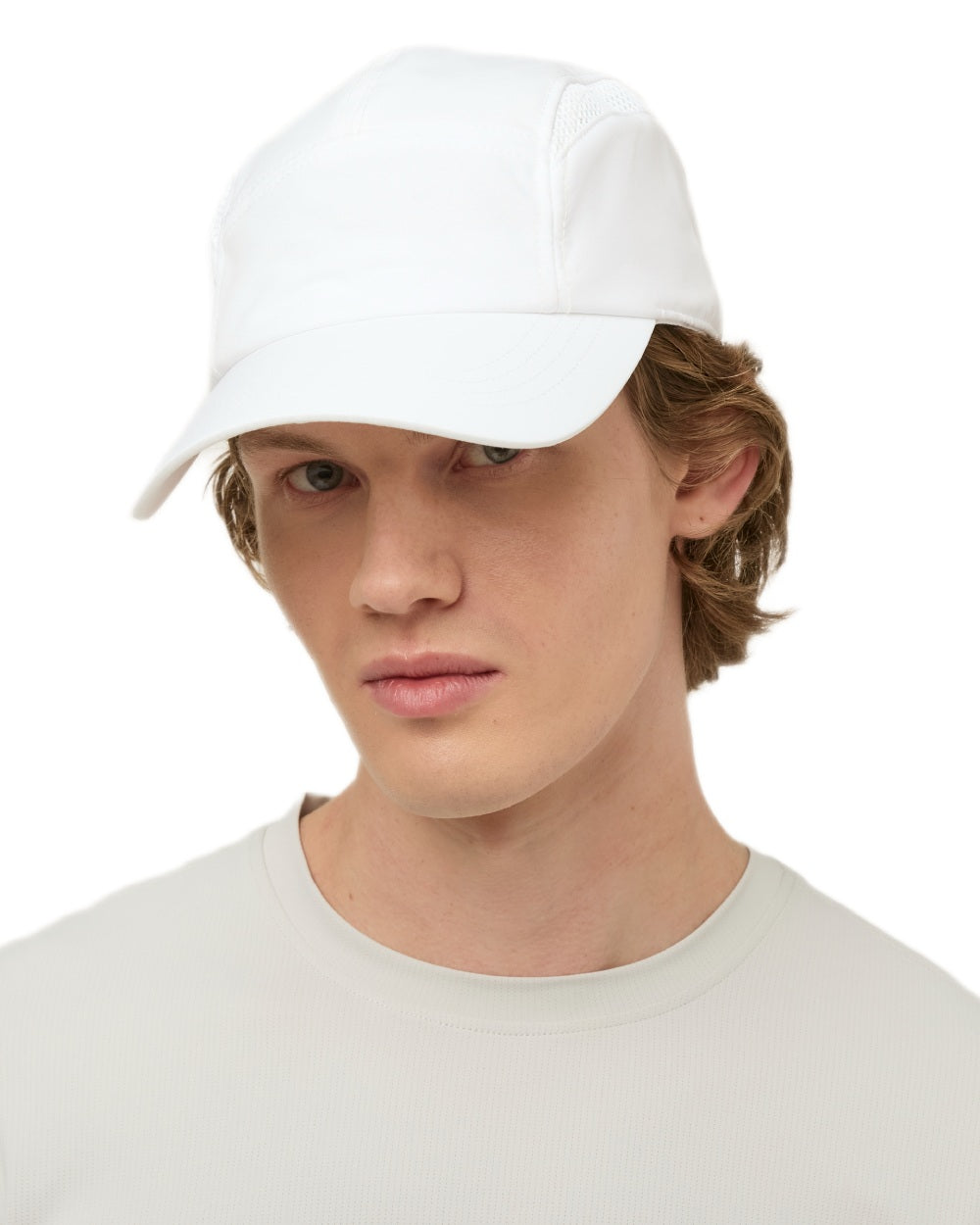 White coloured Tilley Airflo Cap on white background