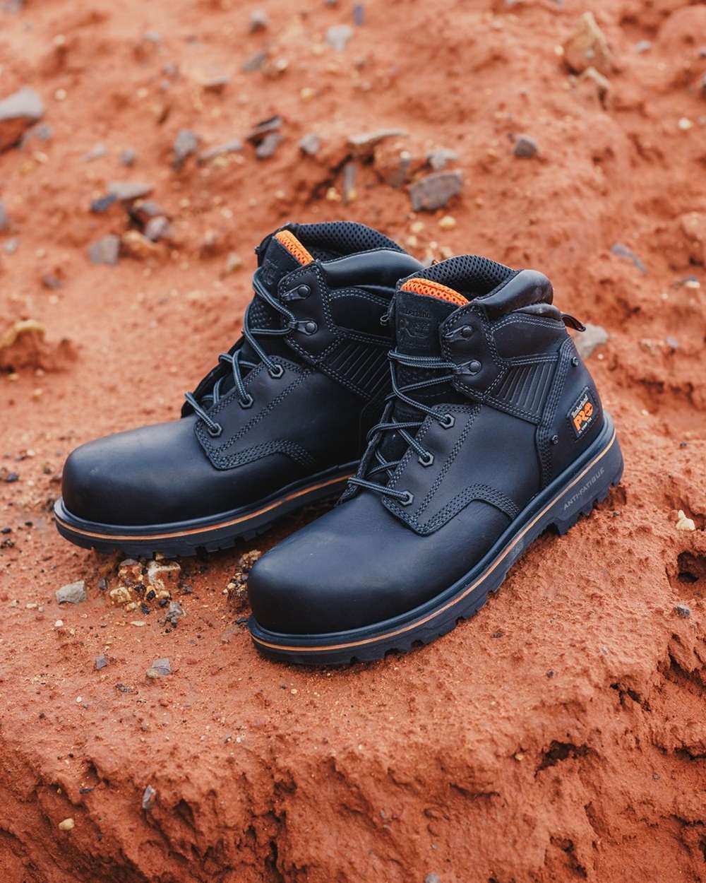 Black coloured Timberland Pro Ballast Safety Boots on ground background