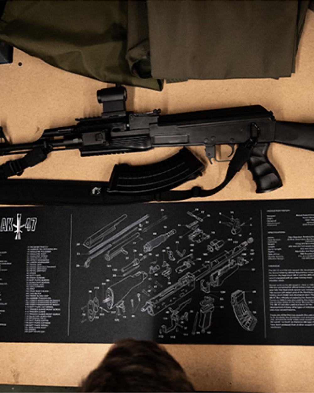 Black Coloured Viper Gun Mat on mat background