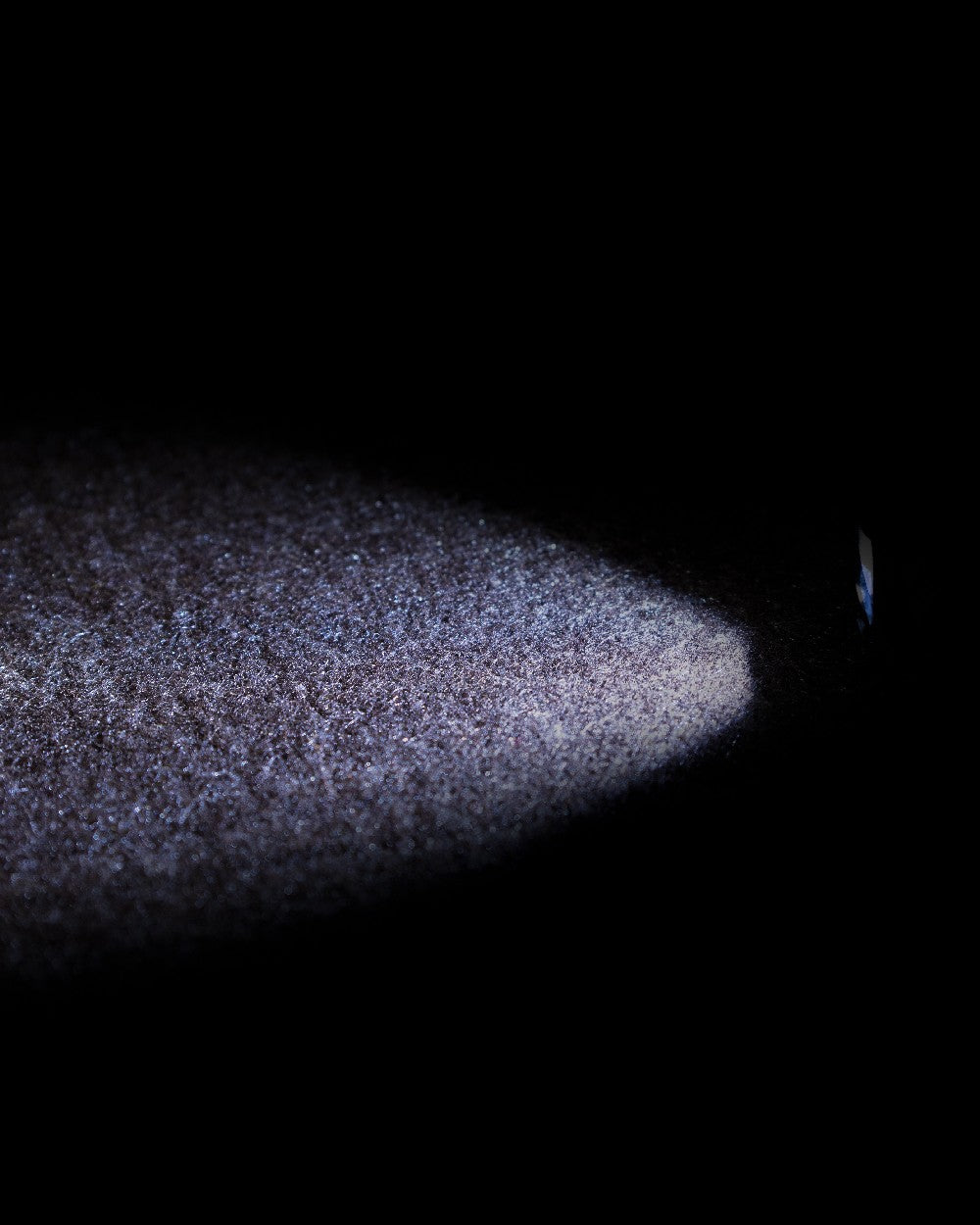 Green Coloured Viper Special Ops Head Torch on blurry background