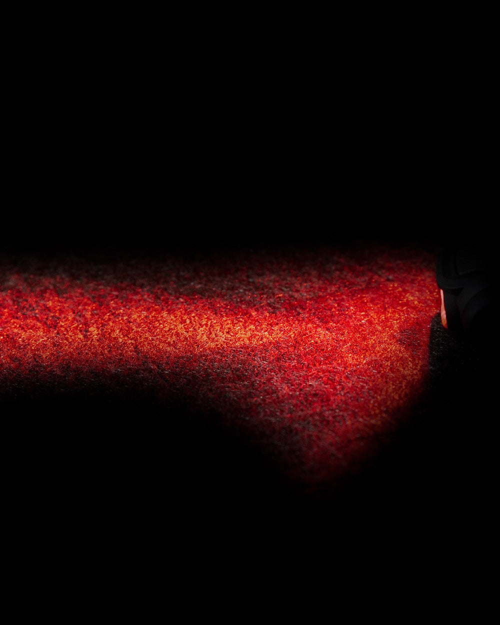 Green Coloured Viper Special Ops Head Torch on blurry background