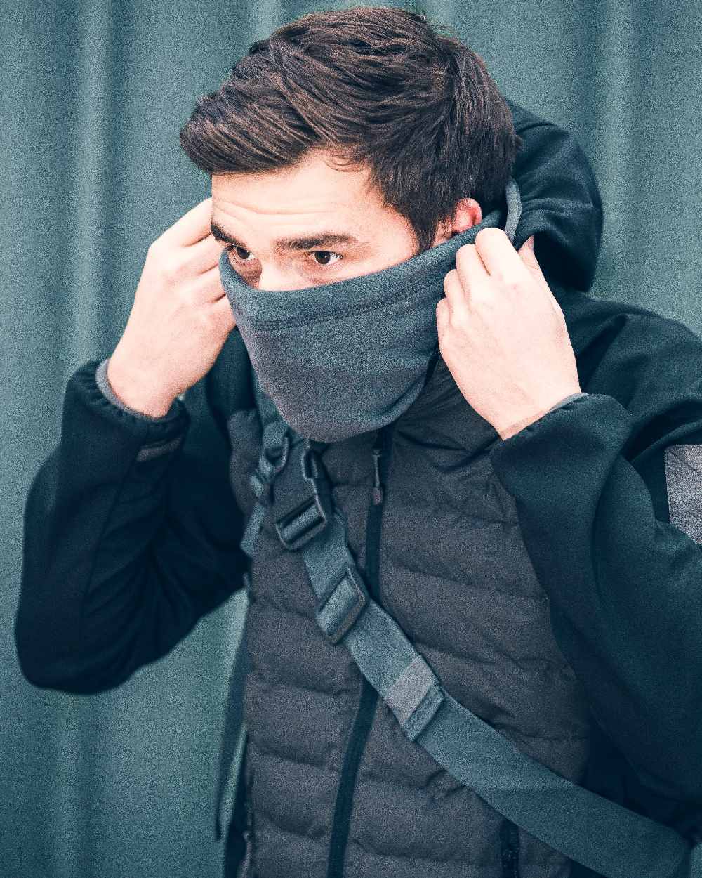 Titanium Coloured Viper Tactical Neck Gaiter on curtain background