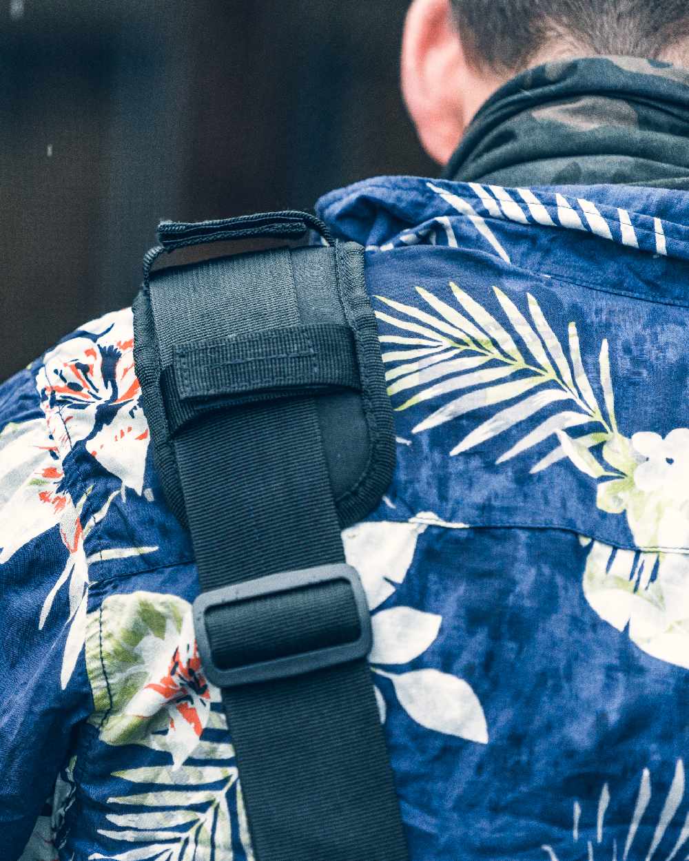 Black Coloured Viper VX Buckle Up Sling Pack on blurry background