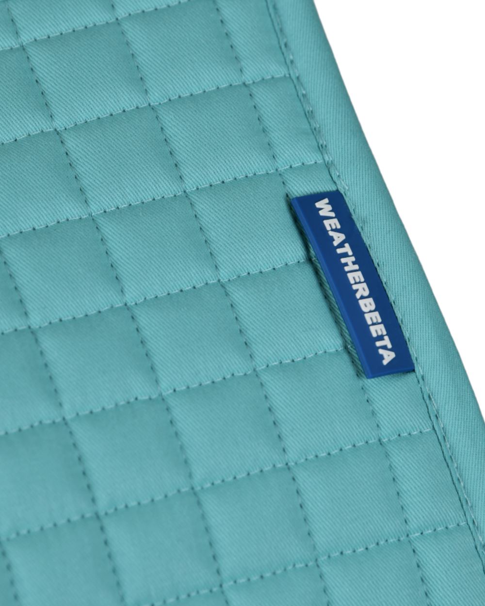 Light Aqua Coloured WeatherBeeta Prime Air-Tec All Purpose Saddle Pad on white background