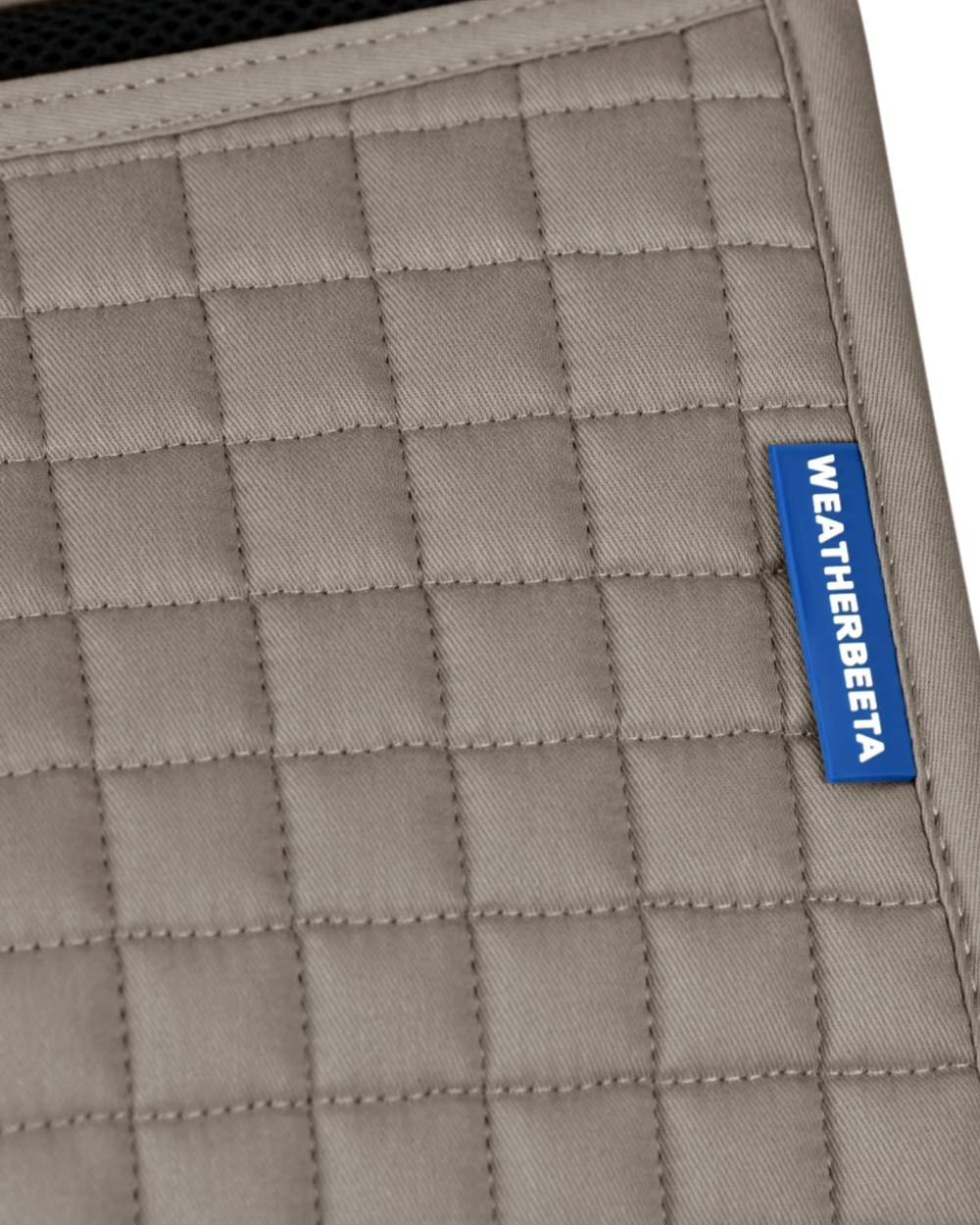 Natural Clay Coloured WeatherBeeta Prime Air-Tec Dressage Saddle Pad on white background