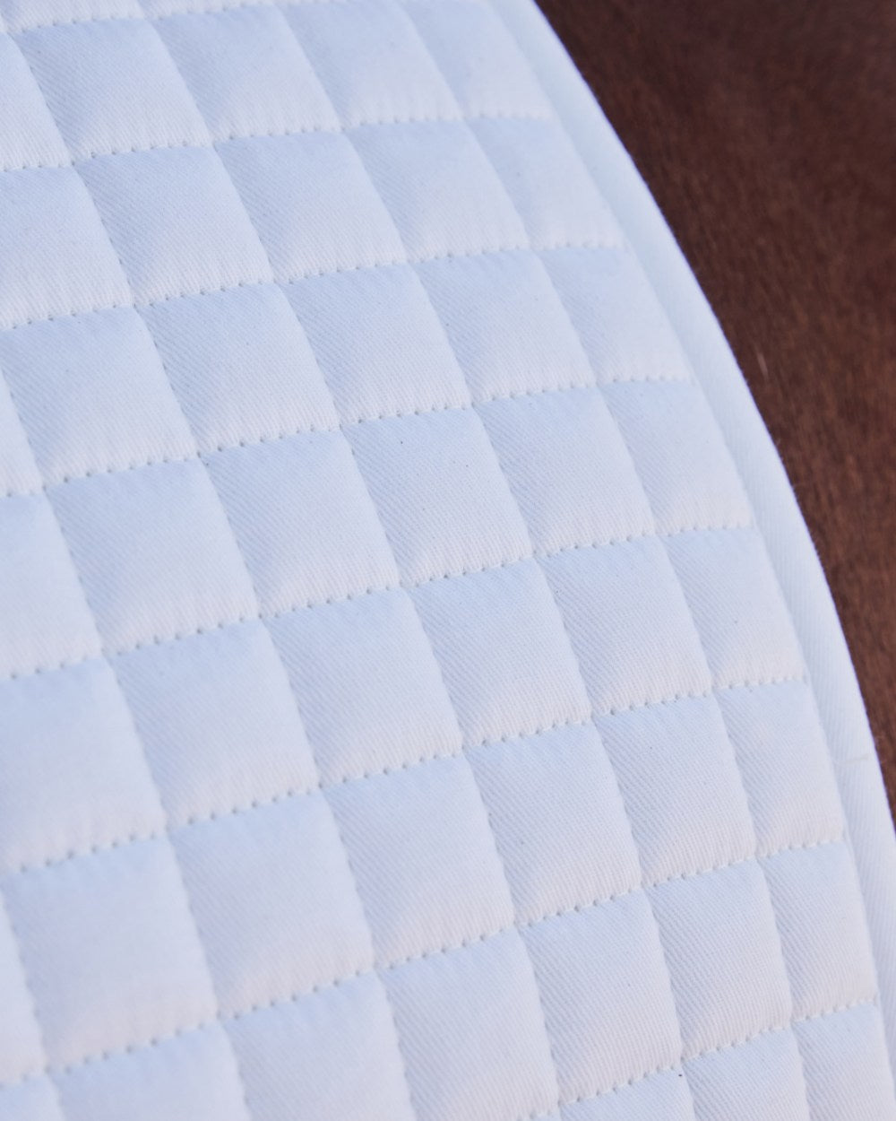 White Coloured WeatherBeeta Prime Air-Tec Dressage Saddle Pad on horse background