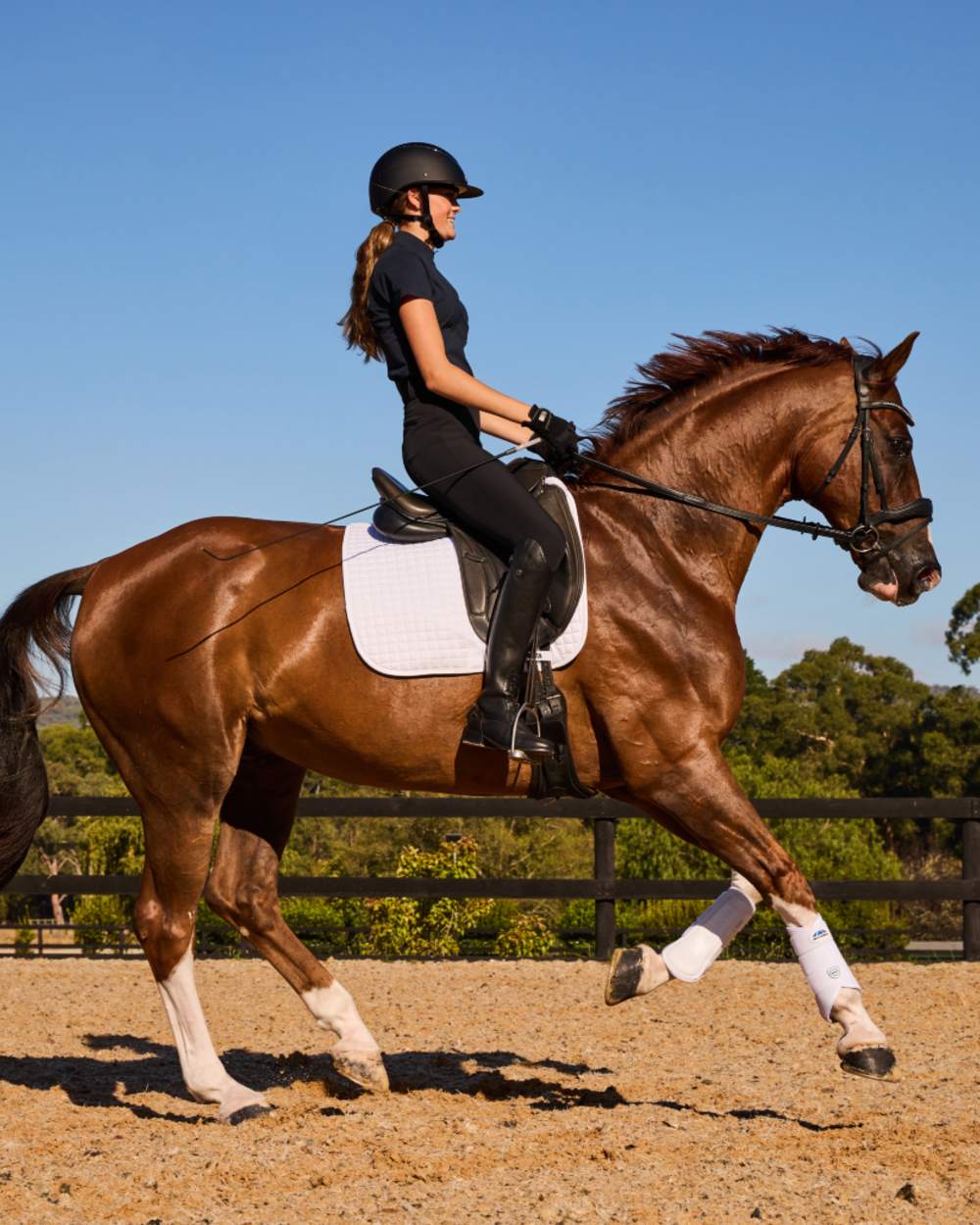 White Coloured WeatherBeeta Prime Air-Tec Dressage Saddle Pad on horse background