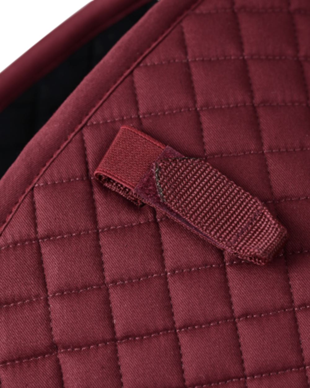 Burgundy Coloured WeatherBeeta Prime Air-Tec Jump Shaped Saddle Pad on white background
