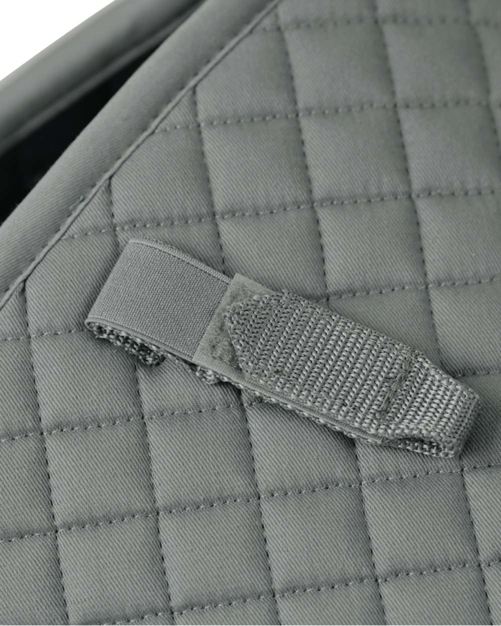 Grey Coloured WeatherBeeta Prime Air-Tec Jump Shaped Saddle Pad on white background