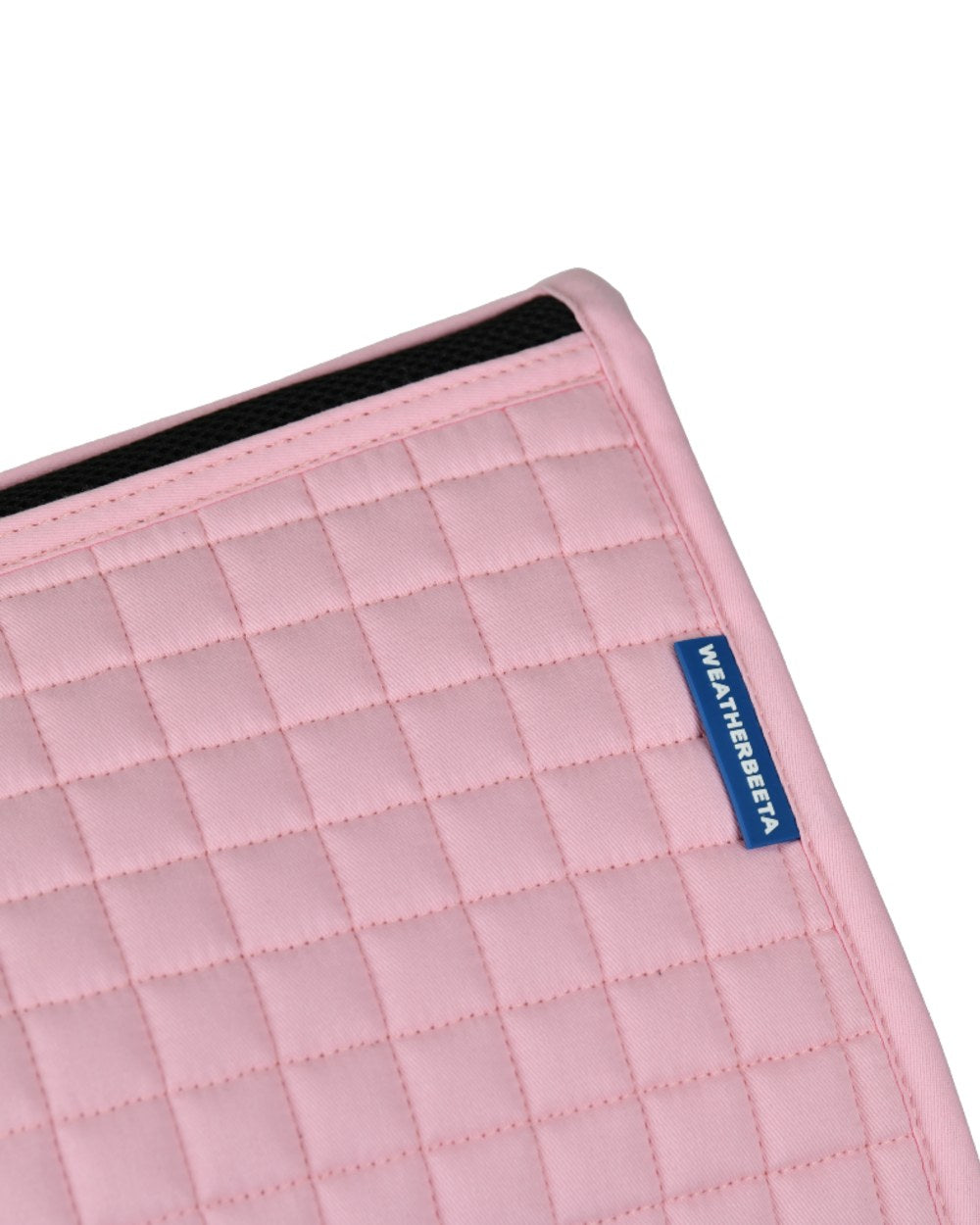 Light Pink Coloured WeatherBeeta Prime Air-Tec Jump Shaped Saddle Pad on white background