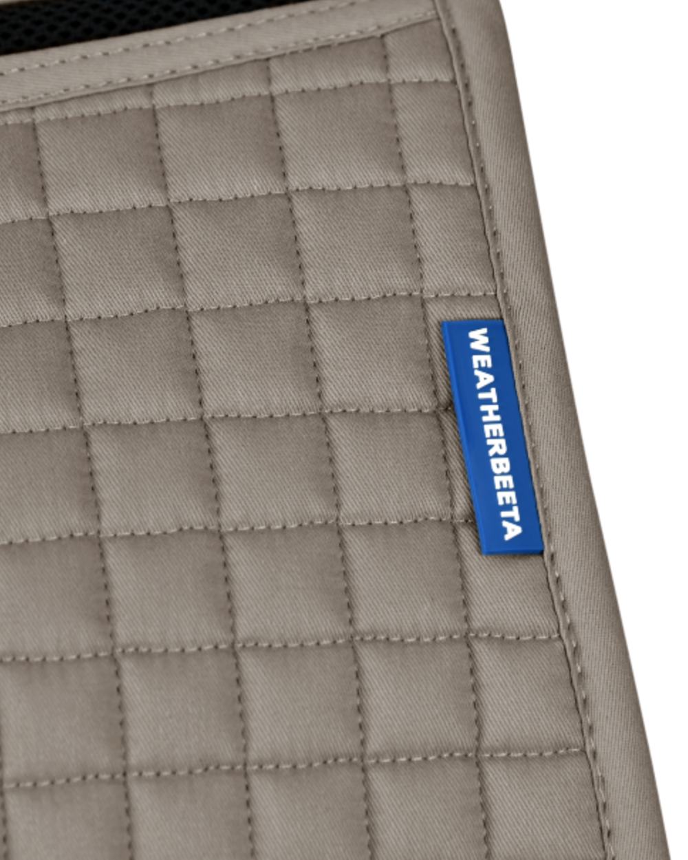 Natural Clay Coloured WeatherBeeta Prime Air-Tec Jump Shaped Saddle Pad on white background