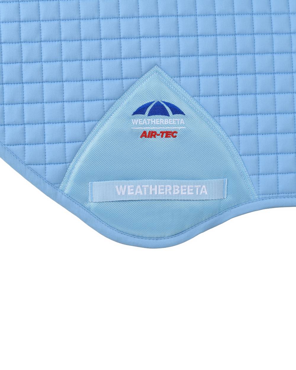 Sky Blue Coloured WeatherBeeta Prime Air-Tec Jump Shaped Saddle Pad on white background