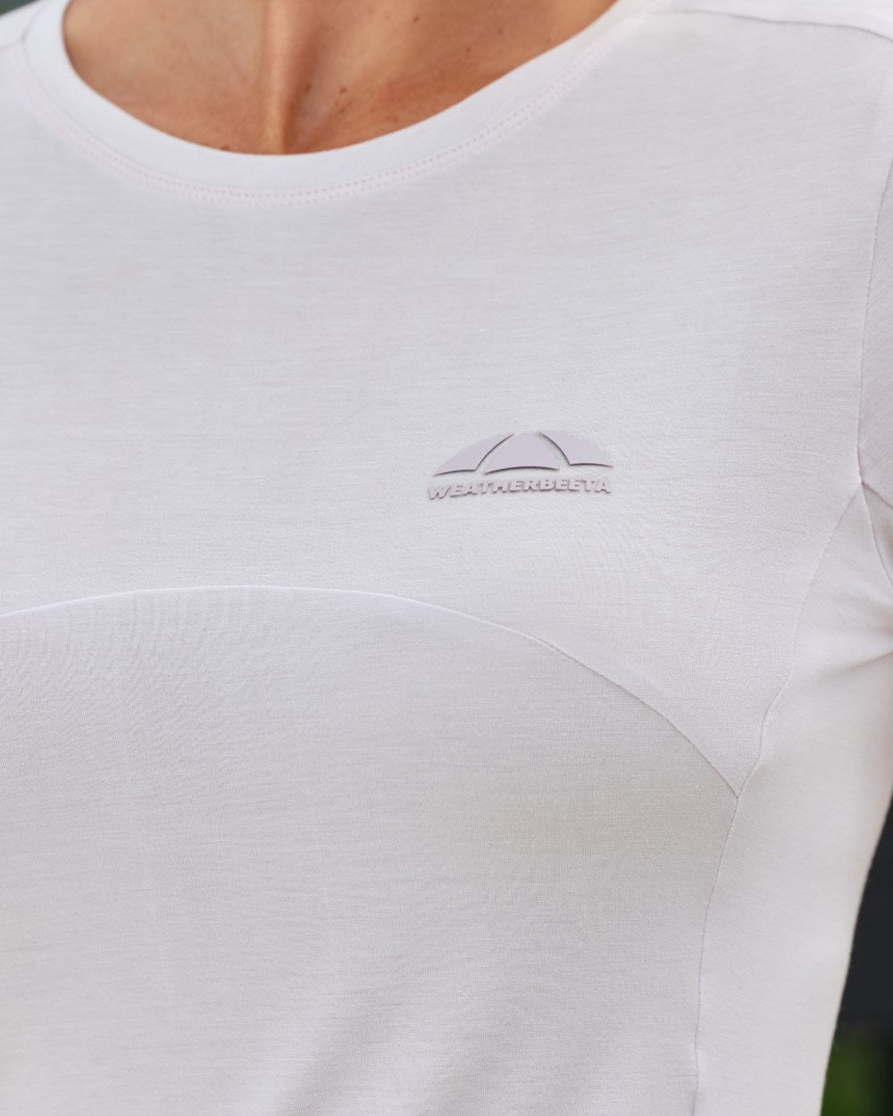Lavender Mist coloured WeatherBeeta Womens 37.5 Lightweight Performance Short Sleeve Top on outdoor background