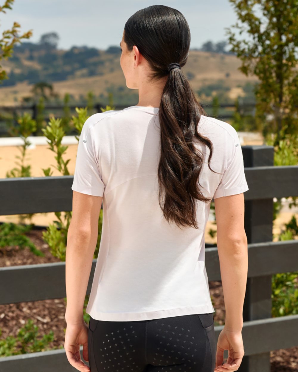 Lavender Mist coloured WeatherBeeta Womens 37.5 Lightweight Performance Short Sleeve Top on outdoor background