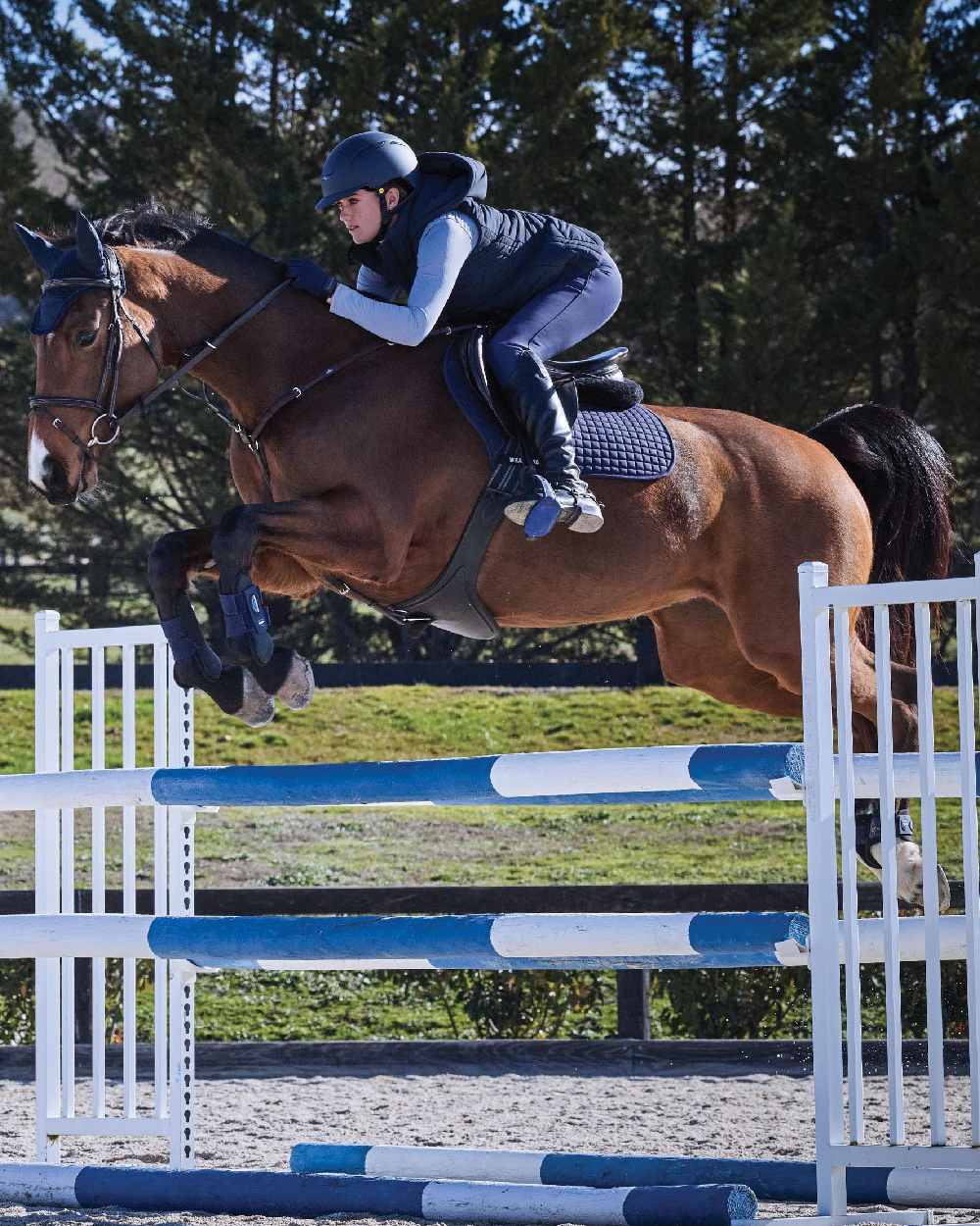 Navy Coloured WeatherBeeta Womens Insulated Vest on outdoor background