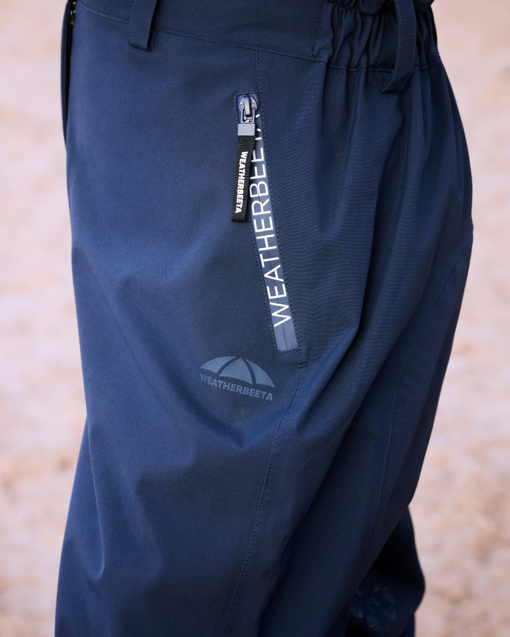 Navy White Coloured WeatherBeeta Womens Rayne Waterproof Overtrousers II on outdoor background