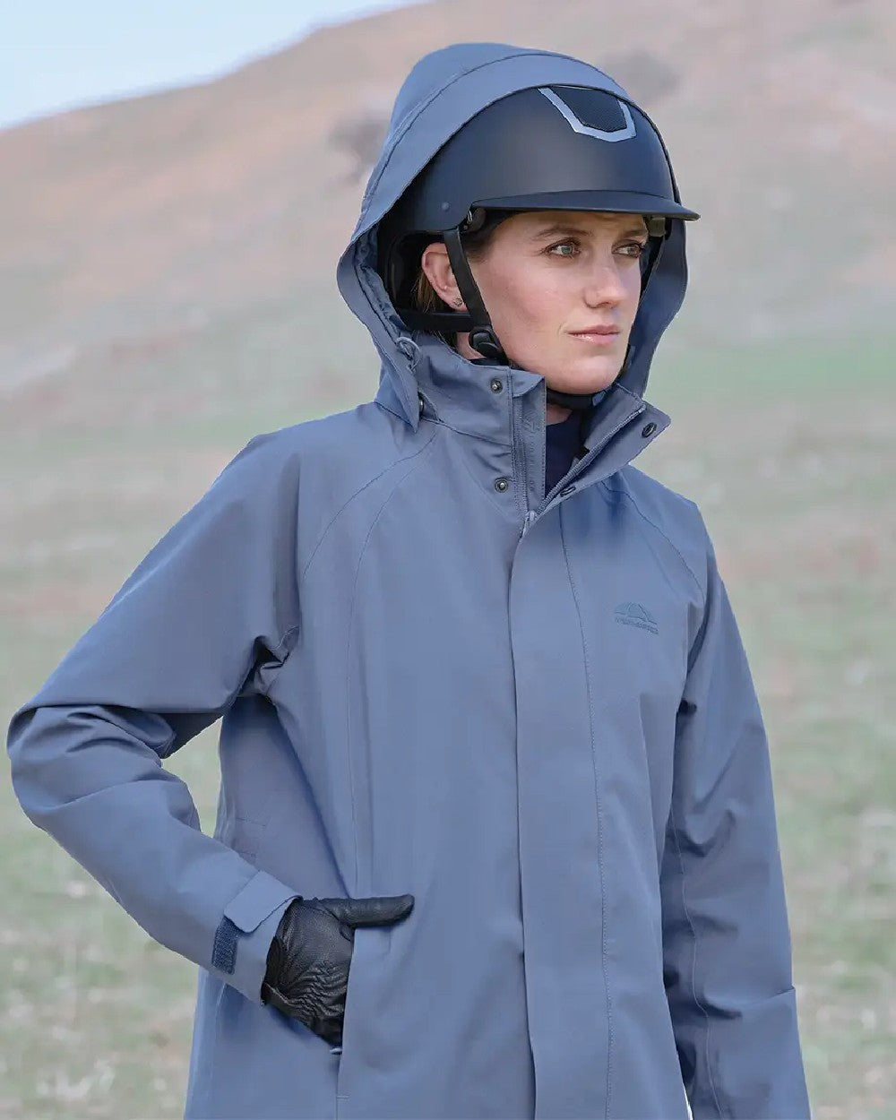 Slate Blue Coloured WeatherBeeta Womens Windbreaker Longline Riding Jacket on outdoor background