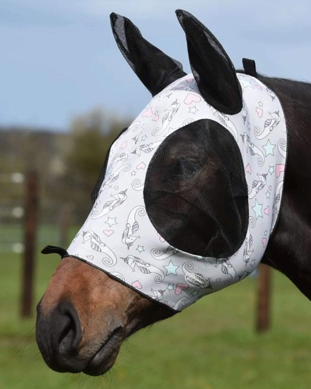 Sea Unicorn Print coloured WeatherBeeta Stretch Bug Eye Saver With Ears on blue background