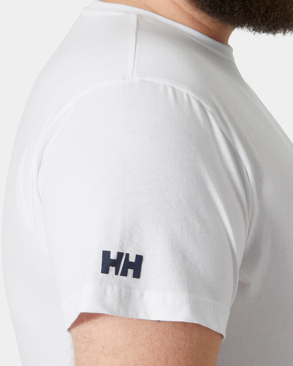 White coloured Helly Hansen Mens Crew T-Shirt on grey background 