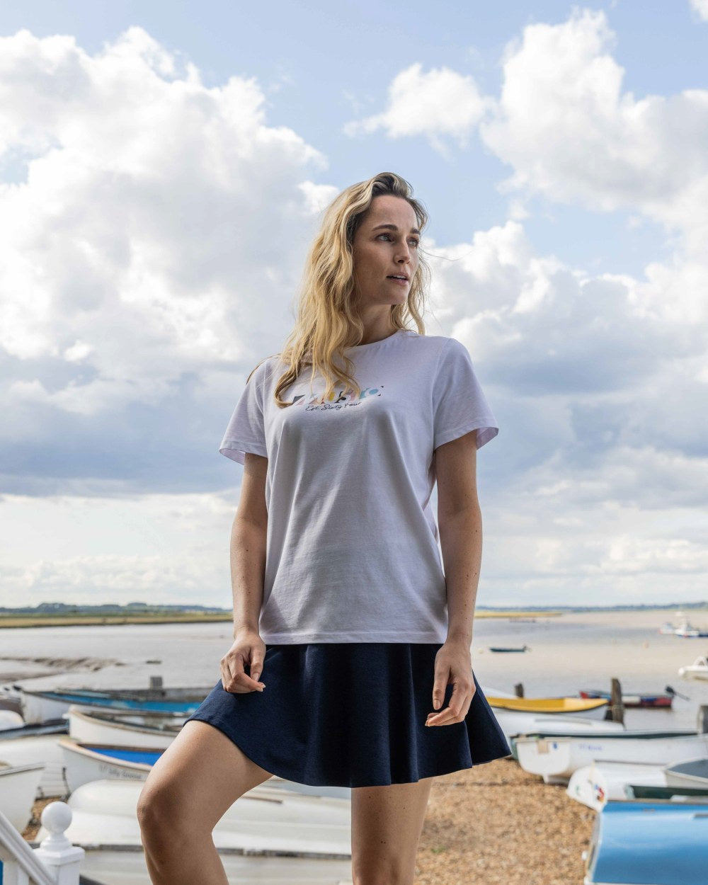 White Coloured Musto Womens 1964 Short Sleeve T-Shirt On A Sea Background 