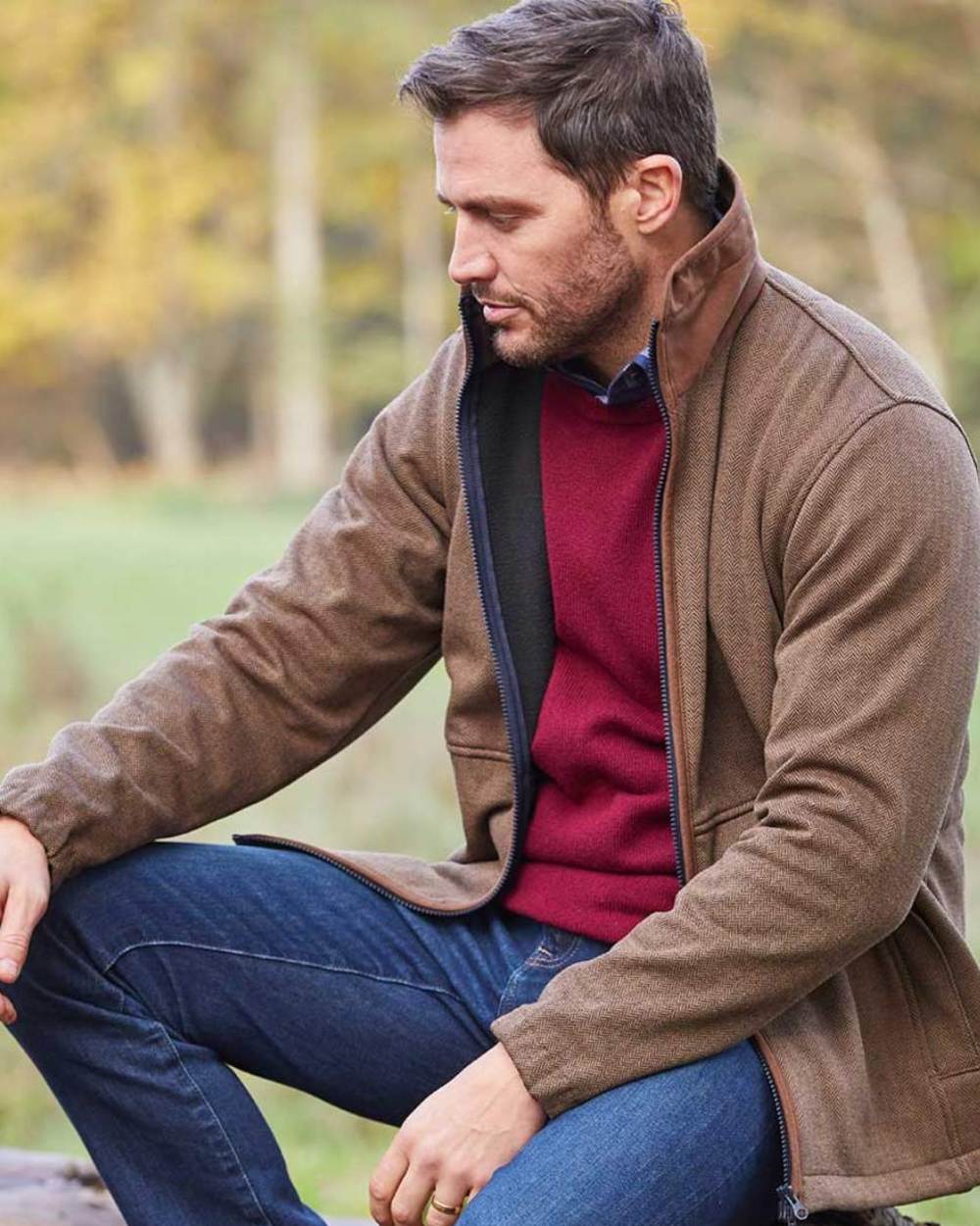 Brown Herringbone Coloured Alan Paine Aylsham Fleece Jacket On A Blurry Background