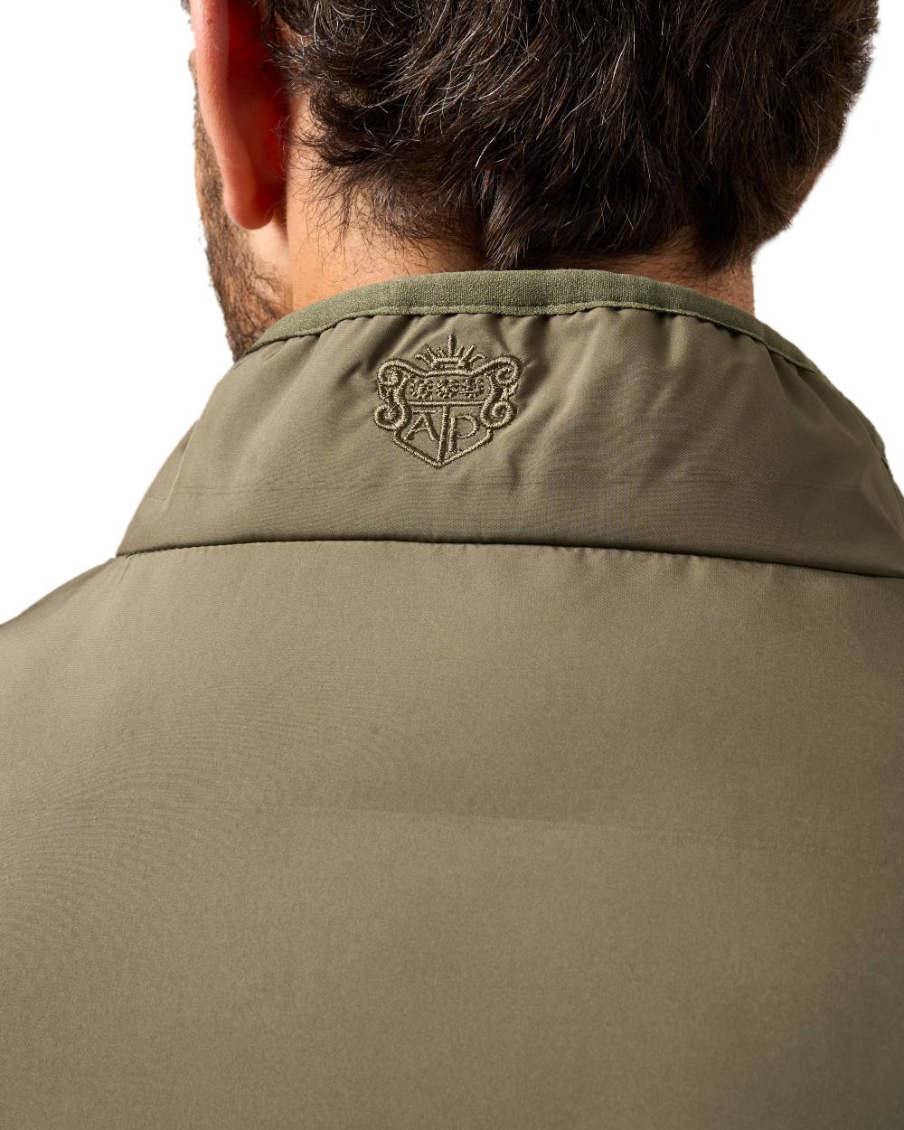 Olive Coloured Alan Paine Mens Calsall Hybrid Gilet On A White Background