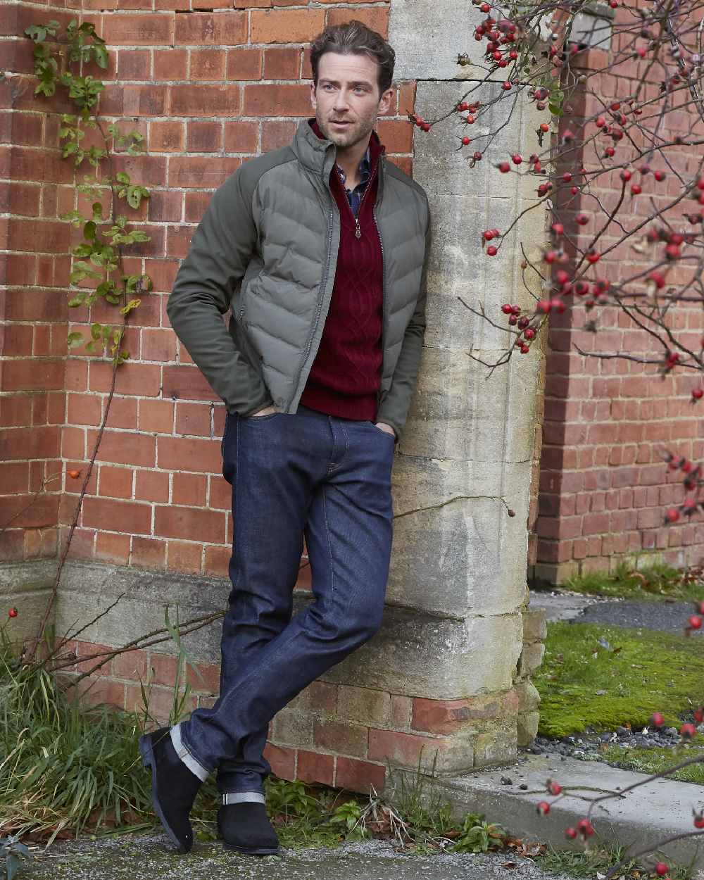 Olive Coloured Alan Paine Mens Calsall Hybrid Jacket On A Brick Wall Background