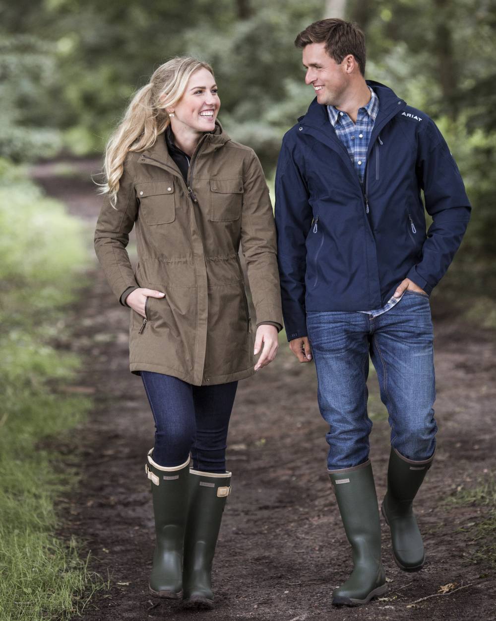 Earth Coloured Ariat Womens Argentium Waterproof Parka On A Forest Background