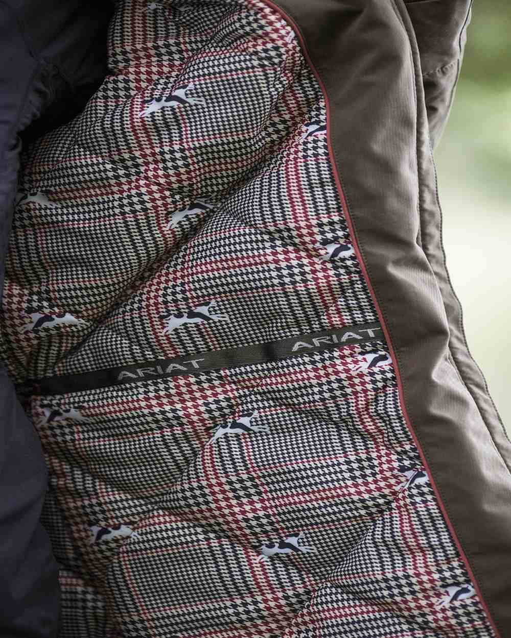 Earth Coloured Ariat Womens Argentium Waterproof Parka On A blurry Background