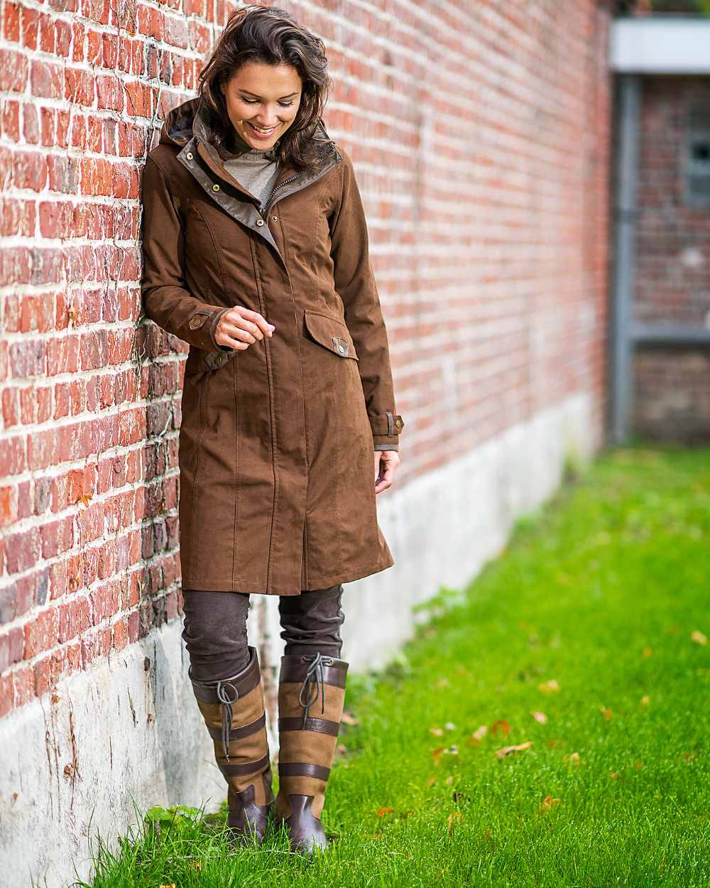 Brown Coloured Baleno Chelsea Mid Length Coat on wall background