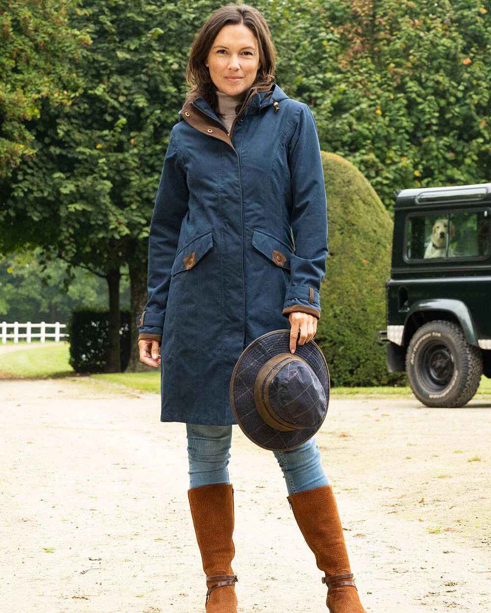 Navy Blue Coloured Baleno Chelsea Mid Length Coat on countryside background