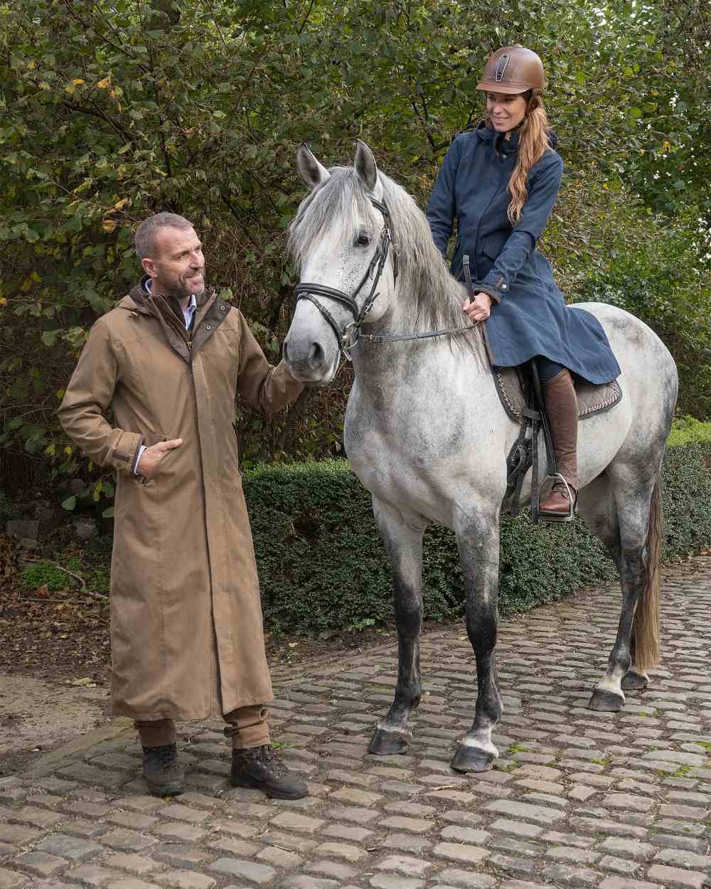 Camel Coloured Baleno Livingstone Long Waterproof Coat On A Street Background