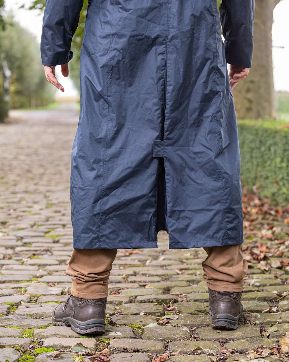 Navy Blue Coloured Baleno Newbury Waterproof Long Coat On A Street Background