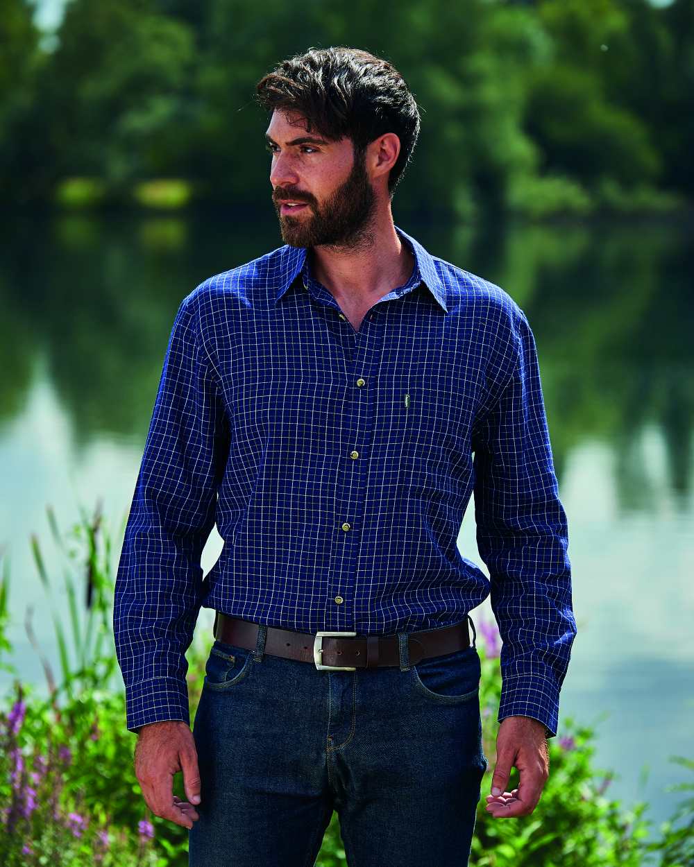 Navy Coloured Champion Castleton Polycotton Shirt On A Lake Background