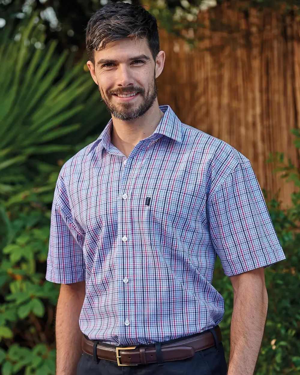 Red Coloured Champion Poole Short Sleeve Shirt On A White Background