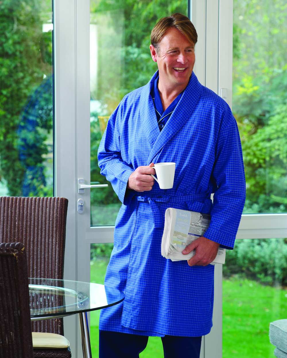 Light Blue Coloured Champion Regal Dressing Gown On A Door Background 
