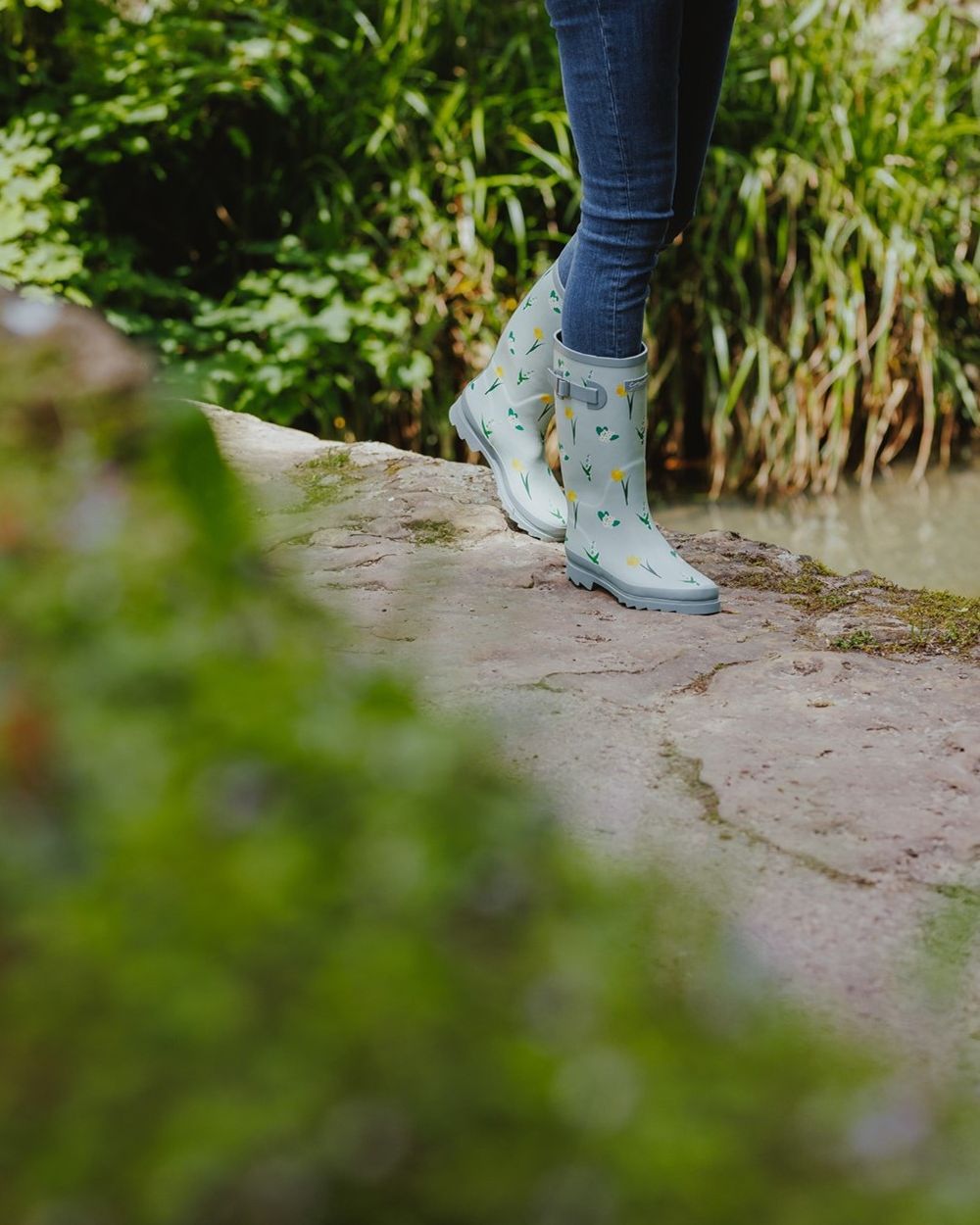 Mint Coloured Cotswold Womens Wildflower Tall Wellingtons on River Background