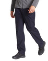 Dark Navy Coloured Craghoppers Kiwi Winter Trousers On A White Background #colour_dark-navy