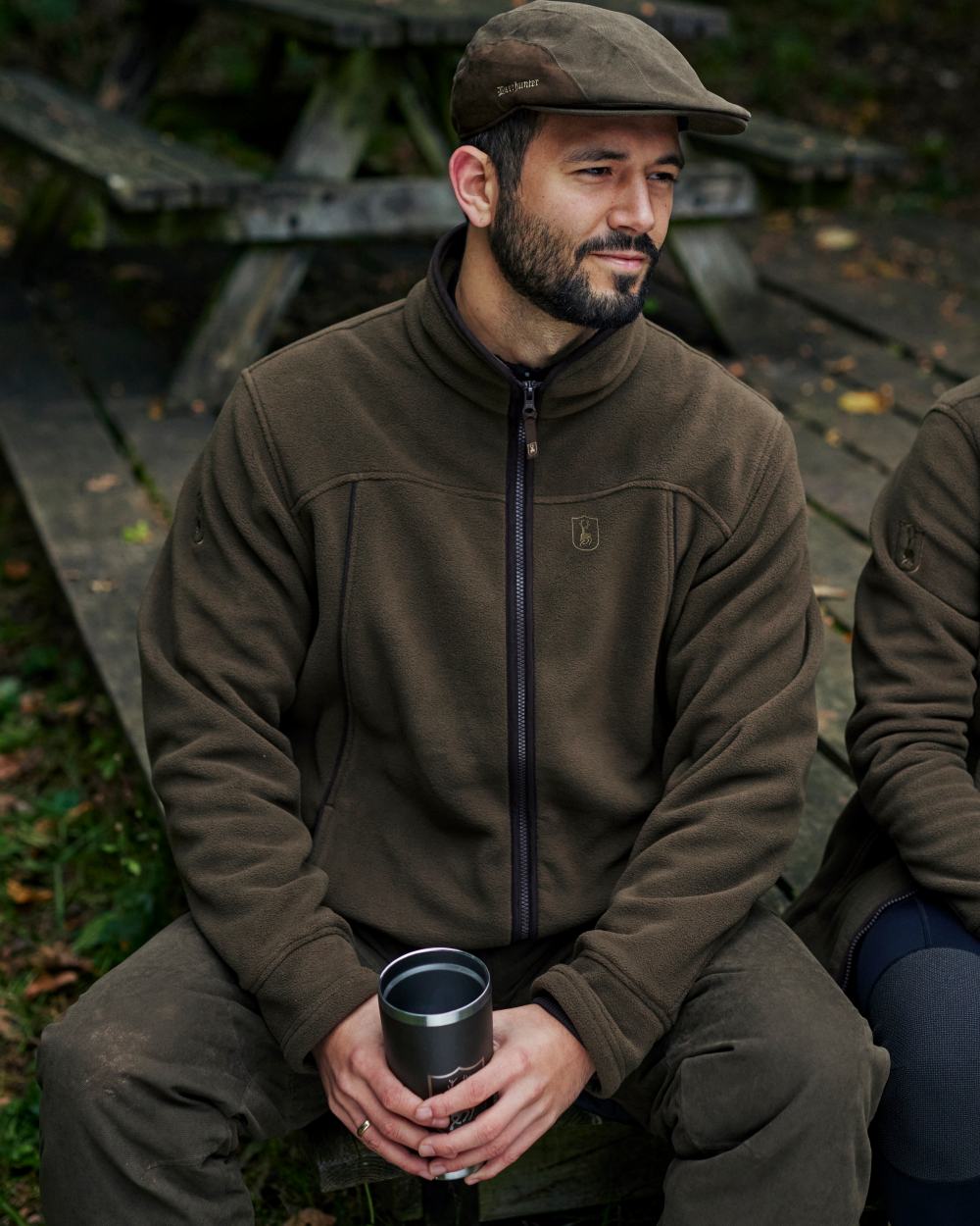 Tarmac Green coloured Deerhunter Eagle Trouser on a forest background