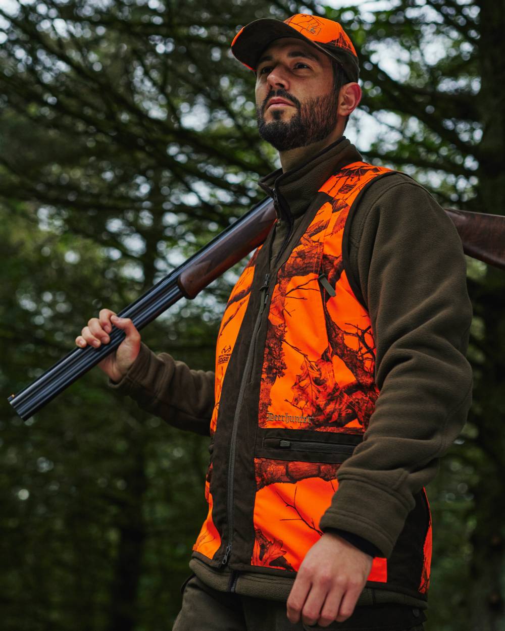 Realtree Edge Orange Coloured Deerhunter Eagle Waistcoat on forest background