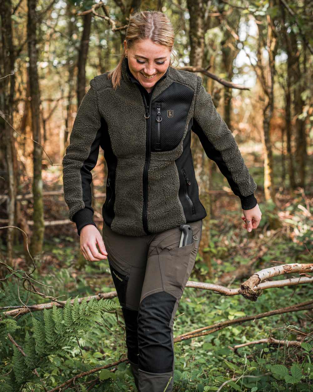 Black Bark Green coloured Northward Trousers on Forest background