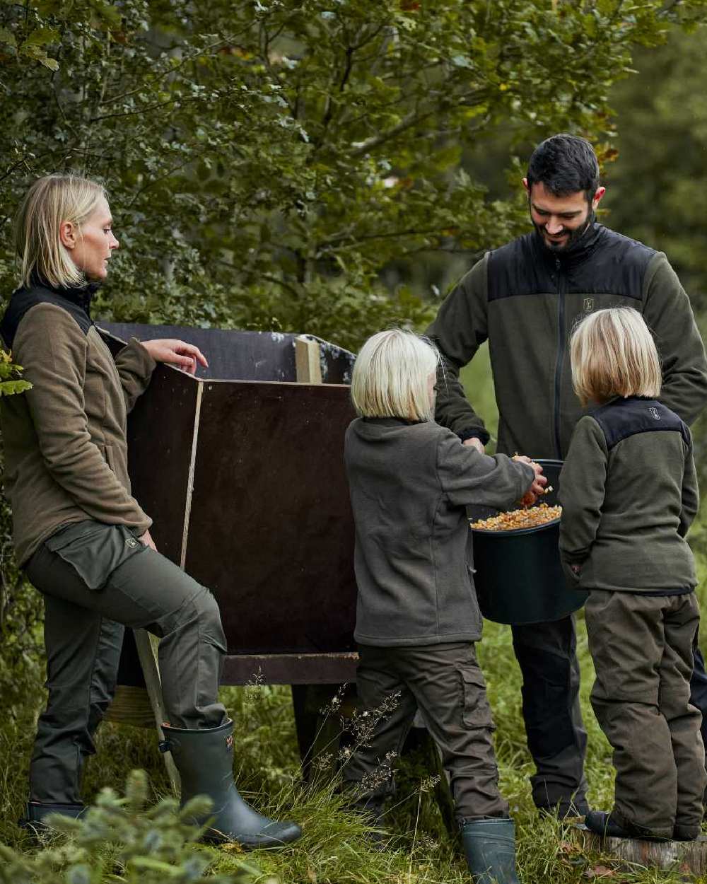 Rifle Green coloured Deerhunter Northward Fleece Jacket on forest background